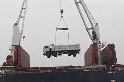 Dump truck in port for delivery